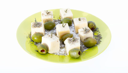 Cheese and olives with rosemary