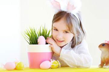 Adorable little girl wearing bunny ears on Easter
