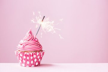 Pink cupcake with sparkler