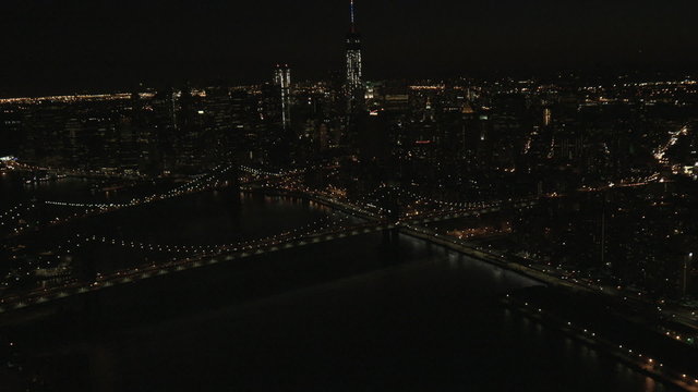 Aerial Manhattan illuminated  1 WTC Brooklyn Bridge Skyscrapers New York USA