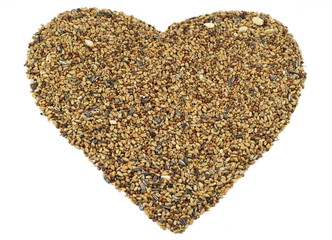 A heart made of bird seed