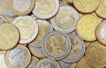 Pile of 50 cents, 1 and 2 euro coins for background