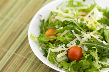 Green Salad on bamboo background