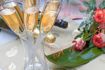 Champagne and bouquet of roses for special occasion