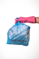 Hand holding trash bag