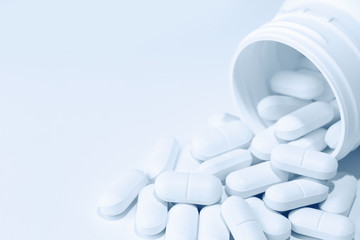 Pills spilling from container