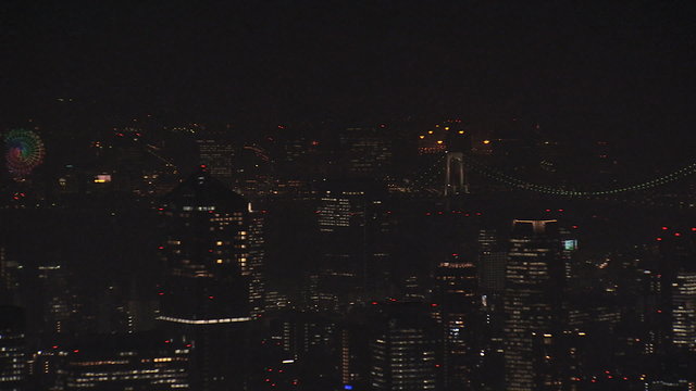 Aerial illuminated Metropolis city night Rainbow Bridge Odaiba Japan
