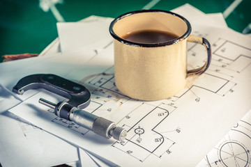 Micrometers, mechanical diagrams and a cup of coffee