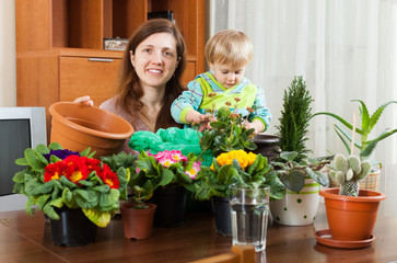 Mother and baby with flowering plants