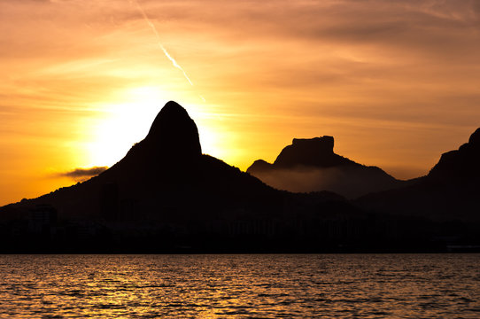 View of Rio de Janeiro Sunset Behind Mountains at the Lake
