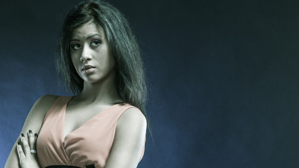 Naklejka premium mixed race girl portrait on blue
