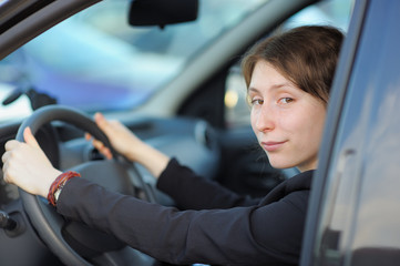 Young woman in a car