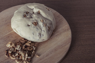 Homemade raw bread dough with  walnuts