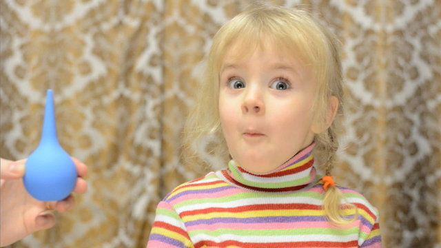 Little Girl Reaction to the Enema Procedure, Slow Motion