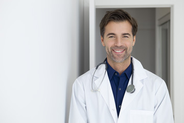 Portrait Of A Smiling Handsome Male Doctor