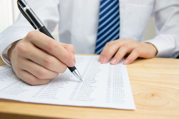 Businessman calculating the financial statements