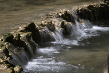 Scenic waterfall with white water cascading over rocks