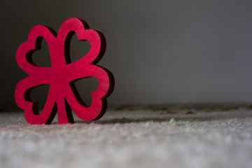 Red wooden four leaf clover
