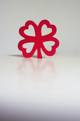 Red wooden four leaf clover