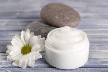 Cosmetic cream with spa stones and chamomile