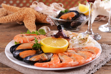 Tasty seafood on plate on table close-up