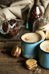Beautiful composition with tasty cappuccino on wooden table