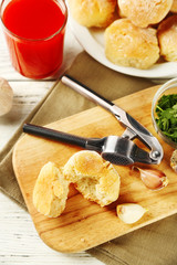 Fresh homemade bread buns from yeast dough with fresh garlic