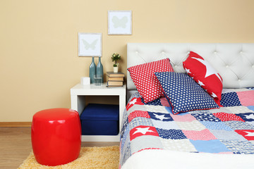 Modern colorful bedroom interior with bed and nightstand, with
