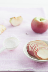 apple and apple slices prepared for apple chips