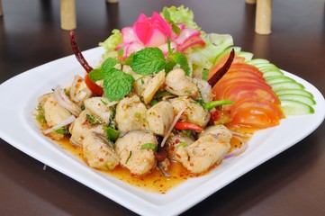 Thai food - Boiled fish spicy Salad with vegetables