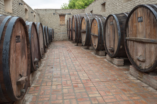 Wine barrels stacked in the winery