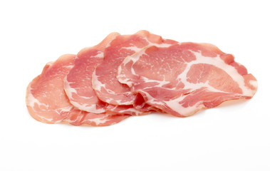 Dried pig meat slices. Delicatess.