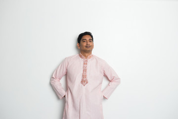 traditional indian male portrait with plain background and copys