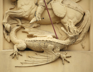Fototapeta premium Saint George killing Dragon. Stucco decoration on Art Nouveau bu