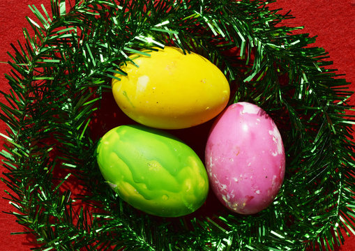 colorful eggs on red background