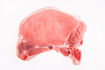 raw pork on a white background - copy space