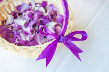 Petals arranged in a basket for the wedding ceremony.