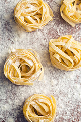 raw pasta and flour