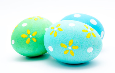 Three colorful handmade easter eggs isolated