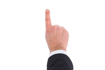 Businessman in suit pointing with his finger