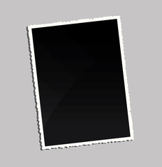 Empty vintage photo frame on table