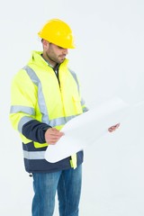 Architect analyzing blueprint