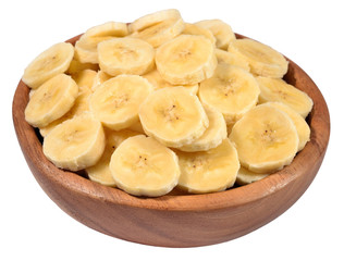 Banana slices in a wooden bowl on a white