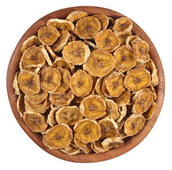 Dried bananas in a wooden bowl on a white