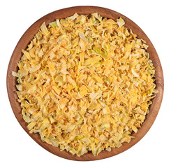 Dried onions in a wooden bowl on a white