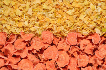 Dried carrots and onions background