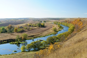 Fototapeta na wymiar Autumn landscape with curved river panorama in Russia