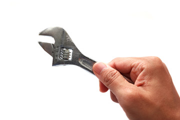Hand holding wrench isolated on white background