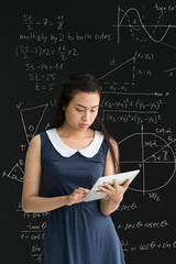 Vietnamese student with digital tablet