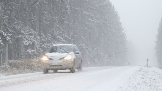 Winter Driving - Traffic on a snowy mountain road